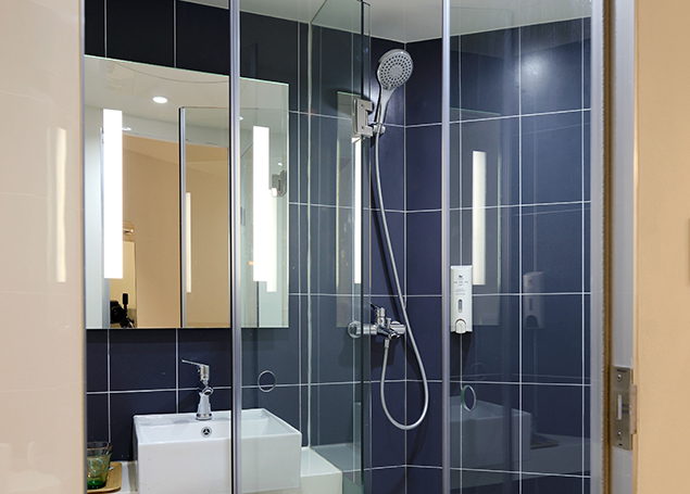 Fiberglass Showers and Glass Doors - Cleaning Bathroom